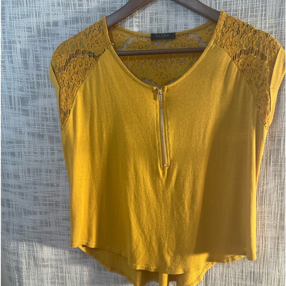 Scobe brand front zip T shirt with lace shoulder